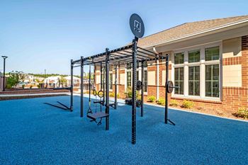 A Playground With Swing at The Aster Apartments, North Carolina, 27519